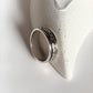 Refined floral spinner silver ring with detailed engravings and smooth rotation
