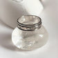 Stylish floral spinner silver ring with a nature-inspired motif