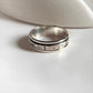 Handcrafted floral spinner silver ring with spinning floral accents