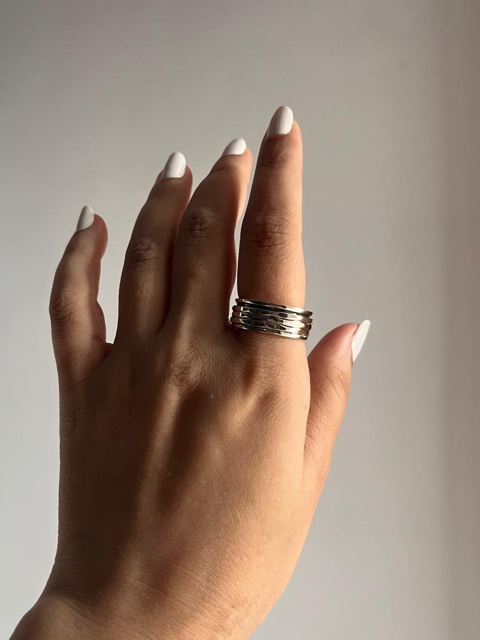 Sterling silver ring with hammered texture and spinning feature