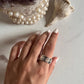 Sleek hammered silver spinner ring design