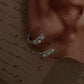 Minimalist silver huggies with opal gemstone accent