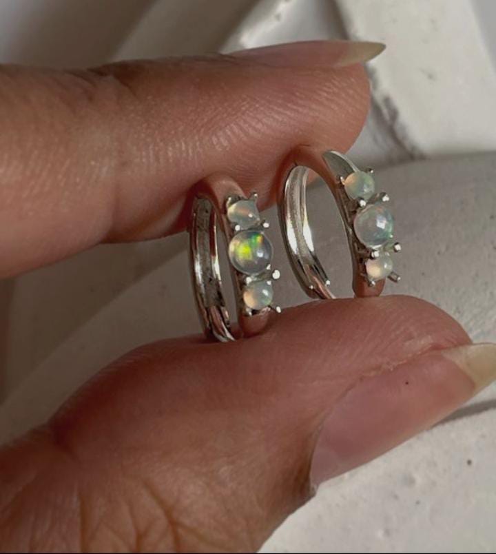 Classic silver huggie earrings with opal detail
