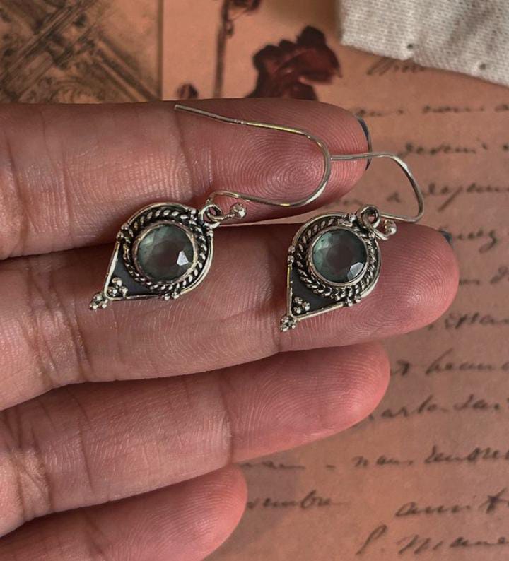 Intricate boho Rawa 925 Sterling Silver earrings with vibrant aqua chalcedony stones.