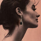 Elegant Black Onyx Pear Hook Earrings in Silver