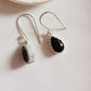 Stylish Black Onyx Pear Hook Earrings Set in Silver