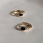 Stylish black onyx croissant huggie earrings with gold vermeil accents