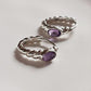Elegant croissant-shaped silver huggies with amethyst