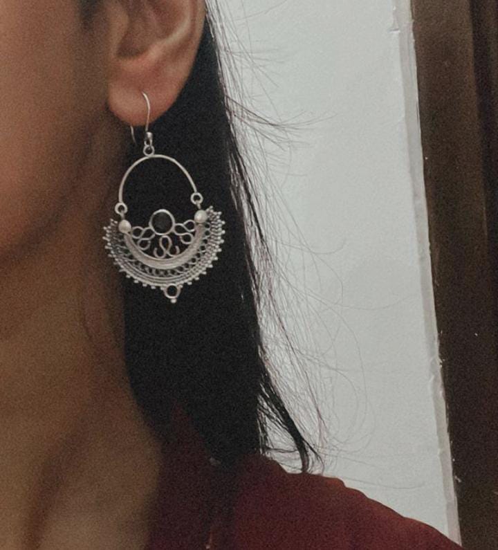 Close-up of Chandbali black onyx silver earrings with detailed craftsmanship