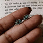 Close-up of evil eye copper turquoise silver studs with detailed design