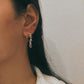 Elegant garnet half hoop earrings in sterling silver