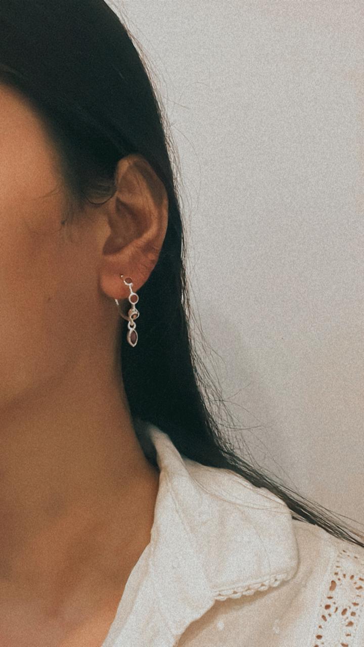 Elegant garnet half hoop earrings in sterling silver