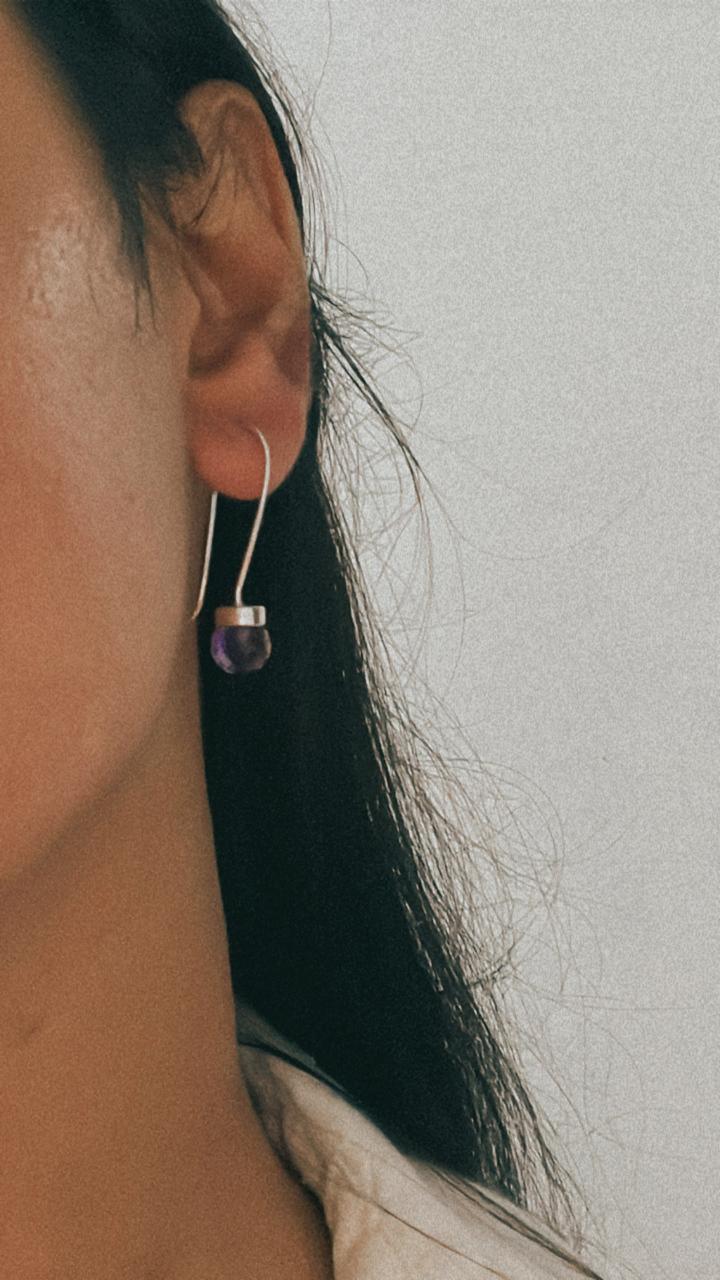 Vibrant round amethyst cut hook 925 Sterling Silver earrings for a pop of color.