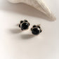Stylish black onyx flower silver studs with elegant craftsmanship.