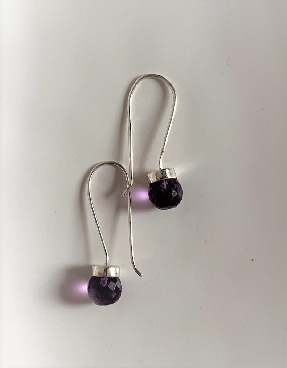 Dainty hook 925 sterling silver earrings with round cut amethyst stones.