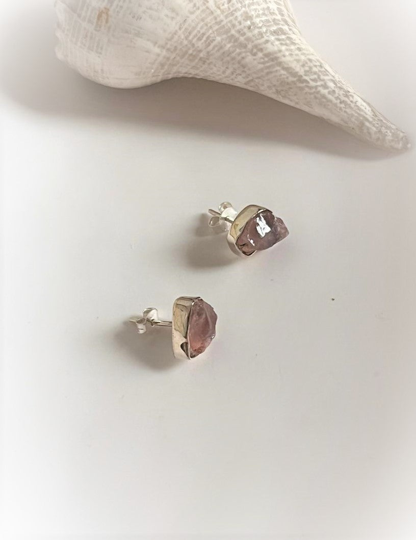 Delicate raw rose quartz silver studs for a minimalist style