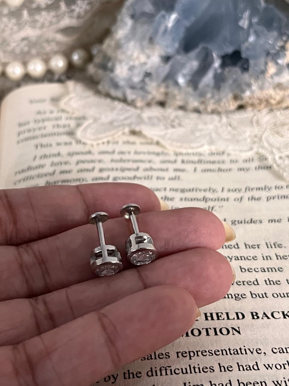 Charming 5mm round CZ stud earrings in sterling silver