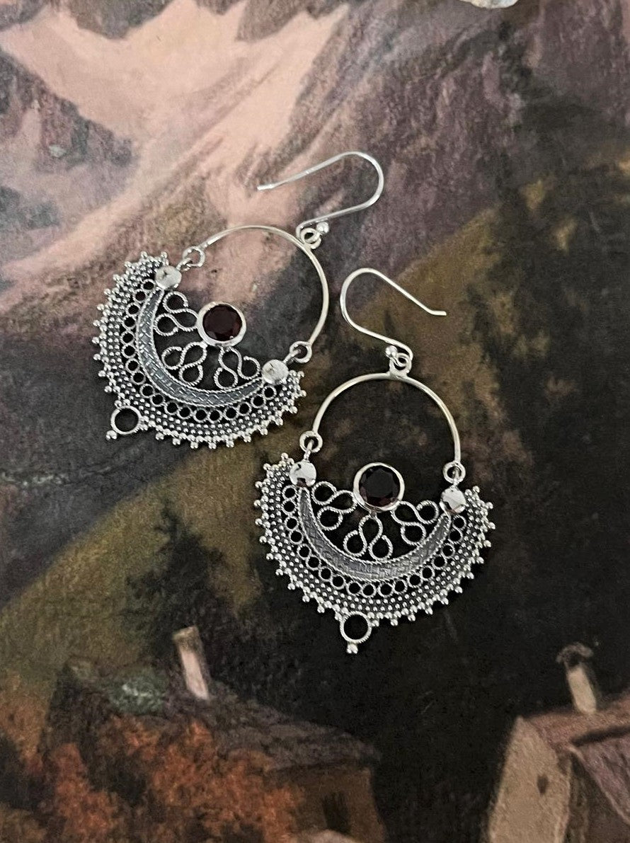 Chandbali silver earrings with stunning garnet gemstones and detailed design