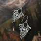 Vintage-inspired 925 sterling silver earrings featuring garnet stones