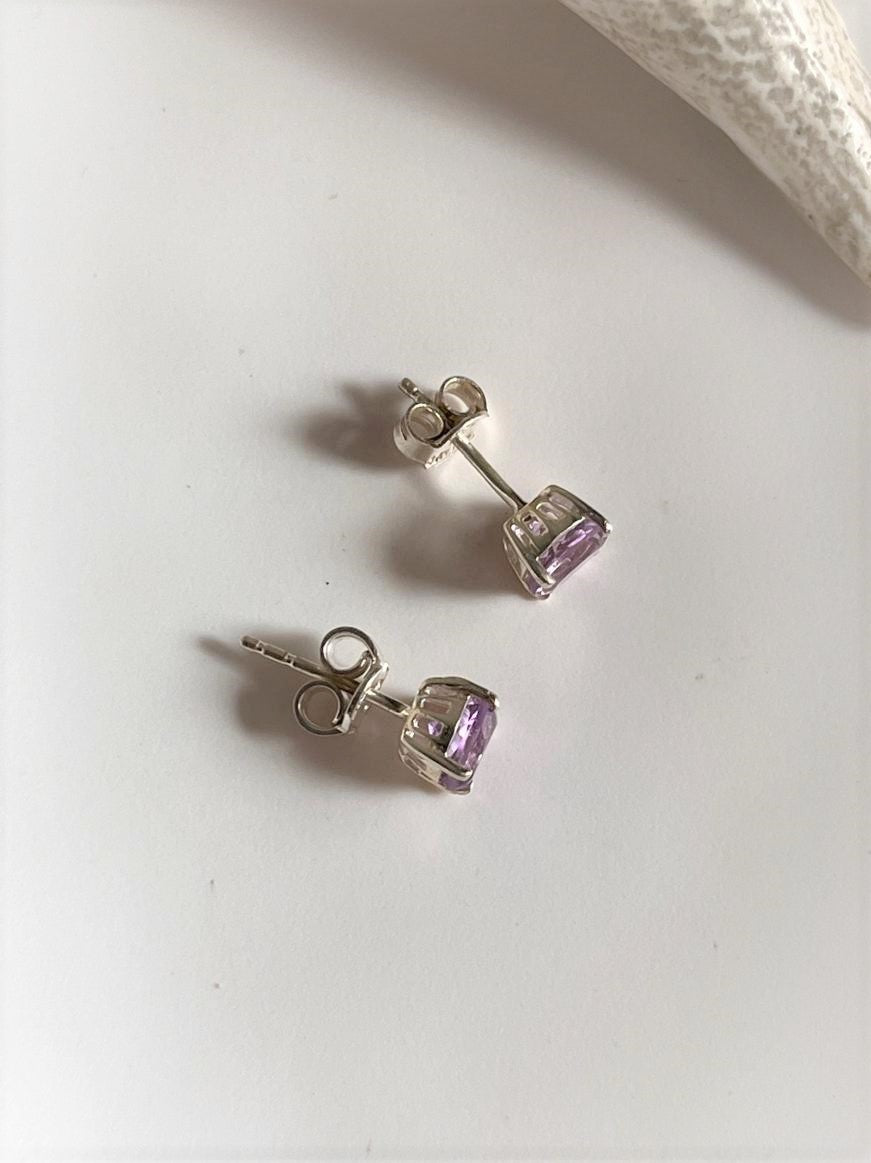Beautiful 4mm round amethyst studs, perfect for casual or formal looks.
