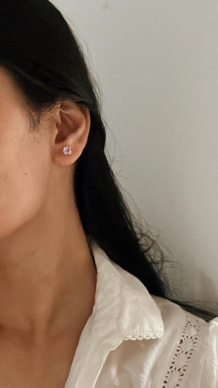 Small 4mm round amethyst studs in sterling silver.