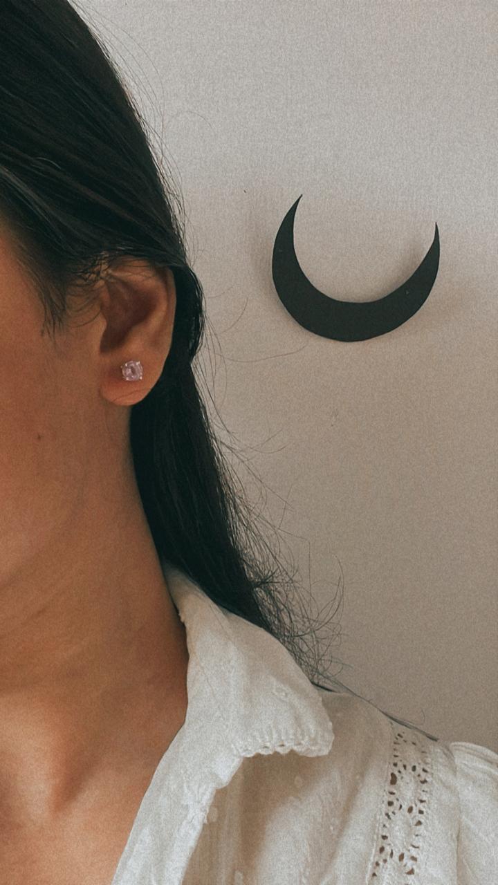 Charming 4mm round amethyst stud earrings in a simple setting.