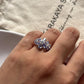Elegant tanzanite flower 2 ring in sterling silver