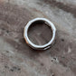 Chic silver ring featuring five clear quartz stones in a modern setting