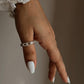 Clear quartz five stone silver ring with clean, polished finish