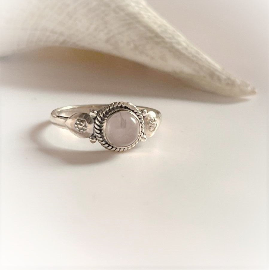 Bohemian-inspired rose quartz round ring in sterling silver
