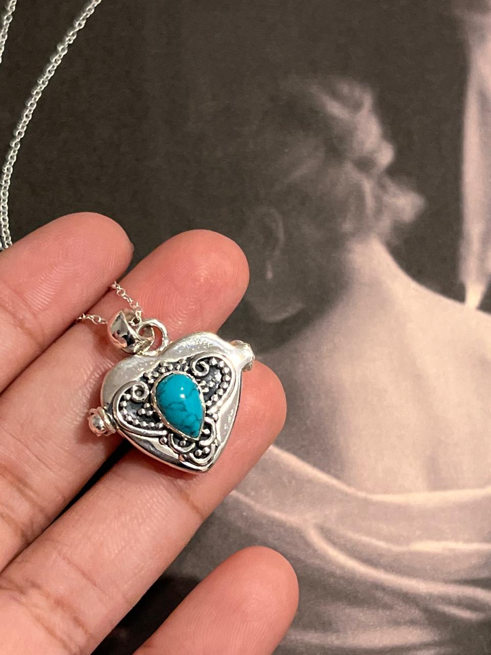 Elegant faux turquoise vintage storage silver pendant with intricate design