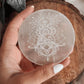 Selenite charging plate with Buddha design for energy cleansing