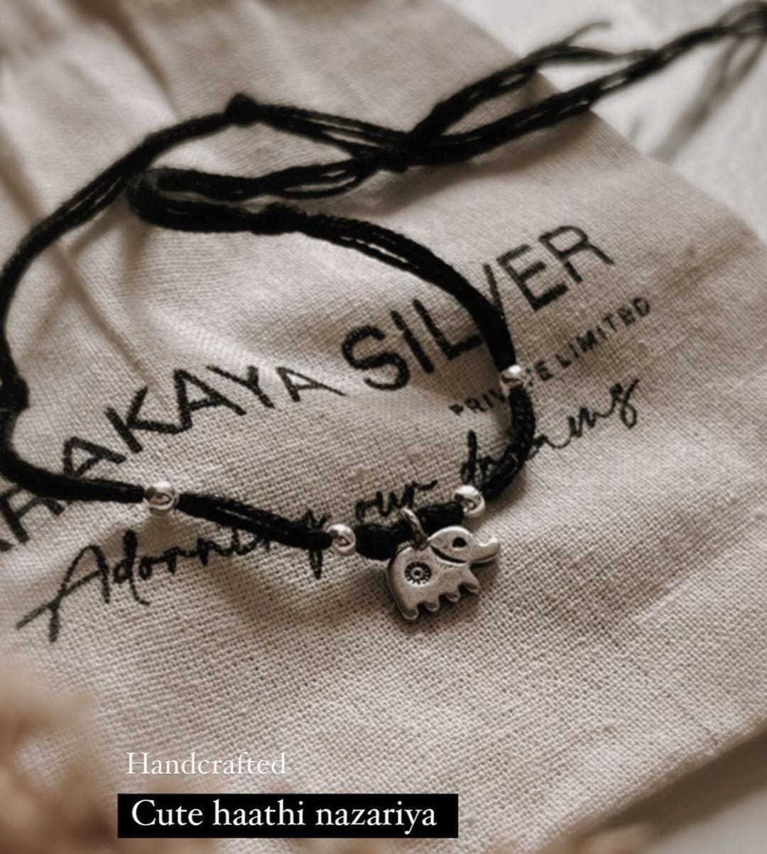 Elegant silver Nazariya bracelet with a cute hathi charm