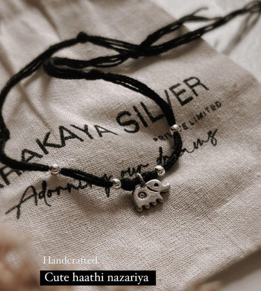 Elegant silver Nazariya bracelet with a cute hathi charm