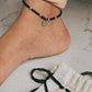 Close-up of cute hathi charm pendant on a silver Nazariya bracelet