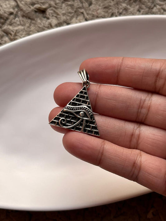 Elegant Eye of Re silver pendant with detailed, ancient symbolism