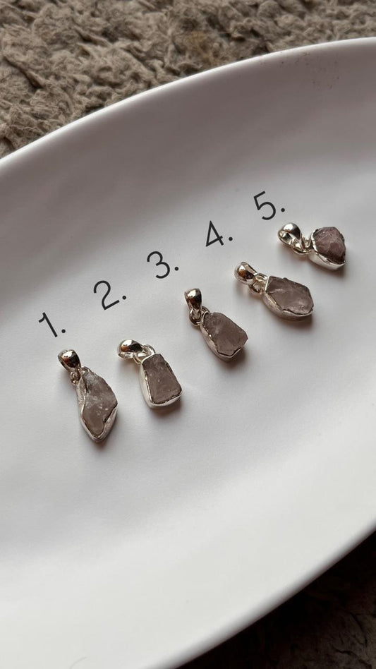 Raw uncut rose quartz pendant in sterling silver