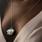 Chic Baroque pearl 4 necklace with four organic pearls set in sterling silver.