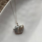 Exquisite silver necklace with four Baroque pearls, perfect for a refined style.