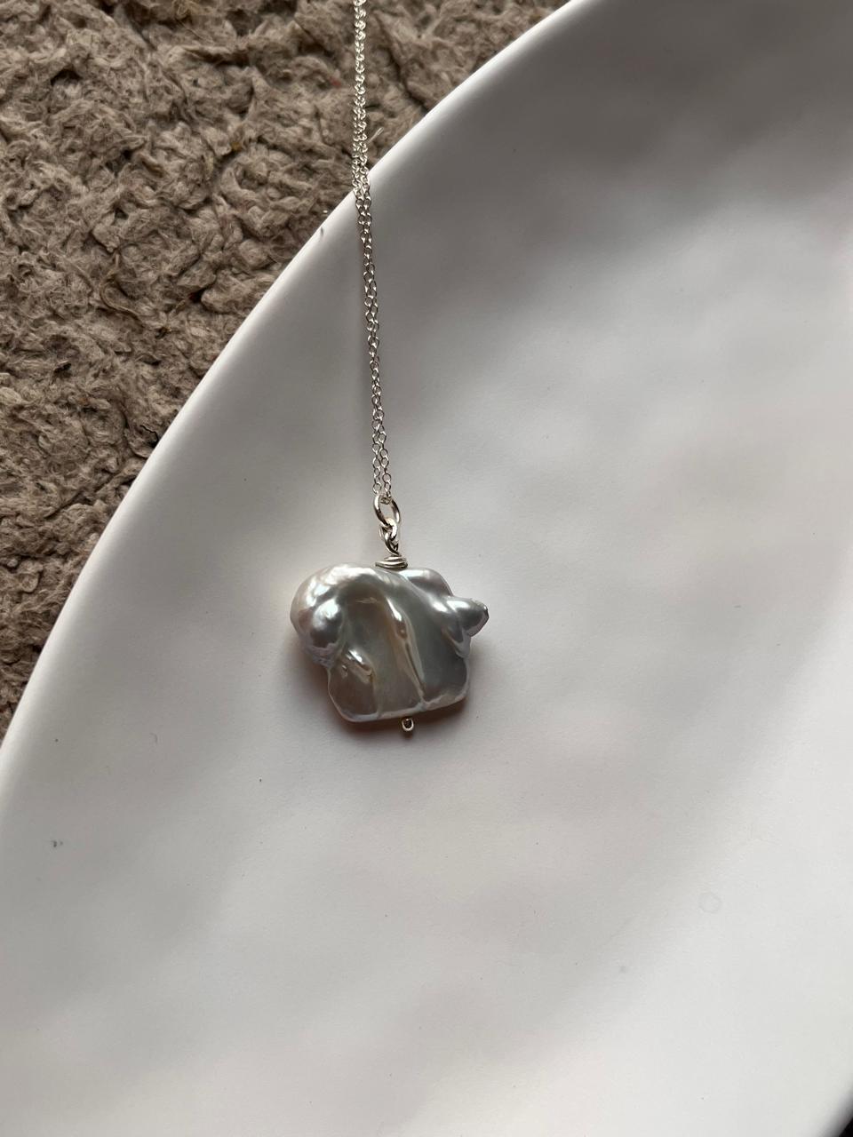 Chic Baroque pearl 4 necklace with four organic pearls set in sterling silver.