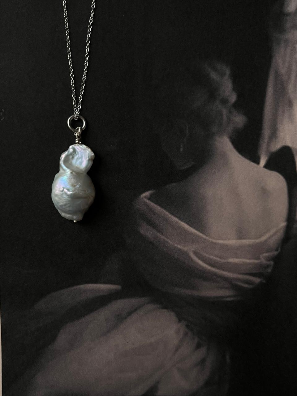 Beautiful silver necklace with three Baroque pearls for a bold and stylish statement.