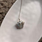 Elegant necklace with four Baroque pearls, each with a distinct and organic shape.