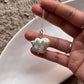 Classic silver necklace featuring four Baroque pearls with natural elegance.