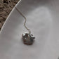 Exquisite silver necklace with four Baroque pearls, perfect for a refined style.