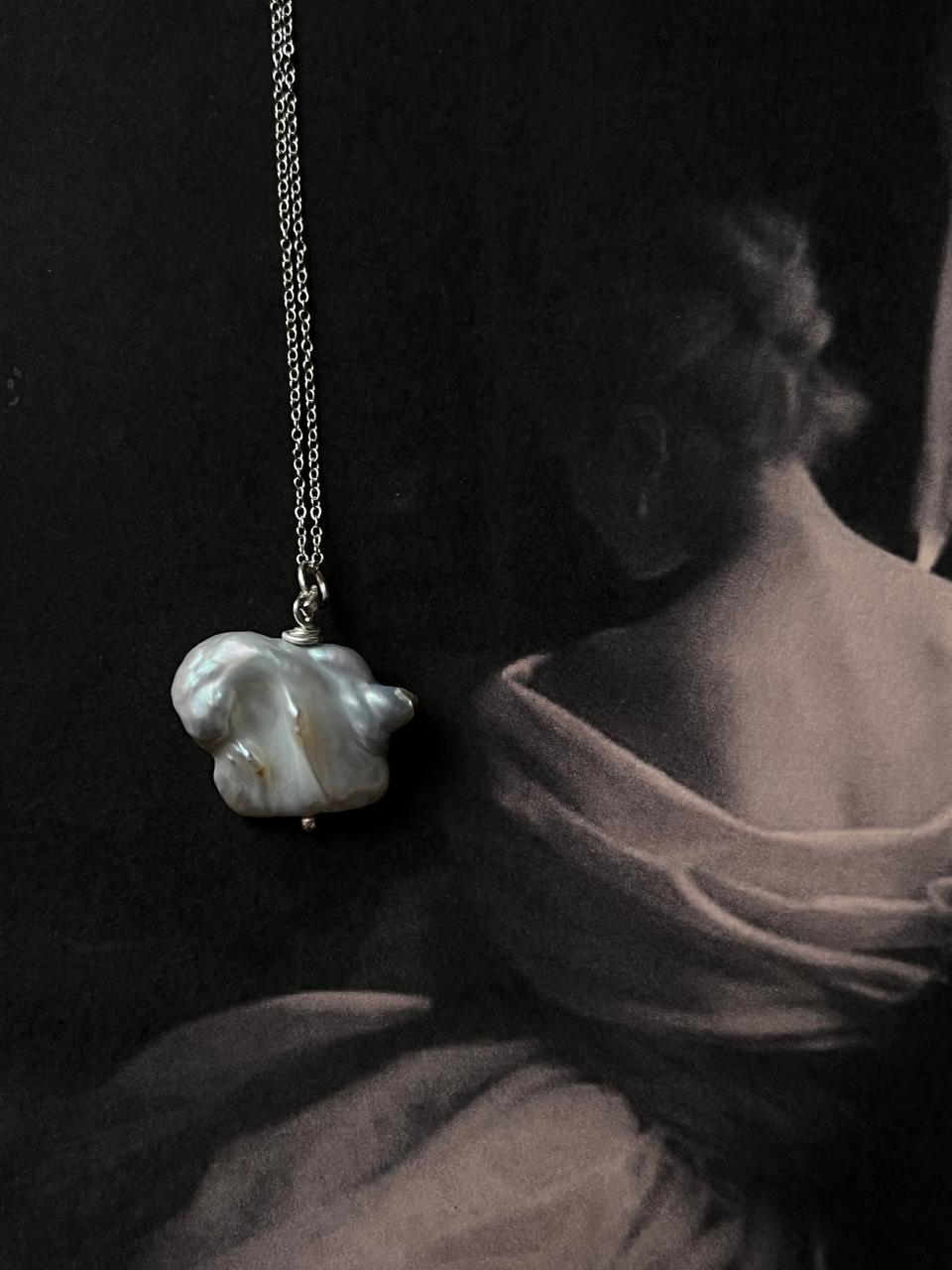 Stylish Baroque pearl 4 necklace featuring four organic pearls in a sterling silver setting.