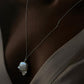 Exquisite silver necklace with two Baroque pearls for a refined look.