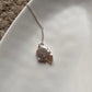 Beautiful silver necklace featuring a pair of Baroque pearls with natural elegance.