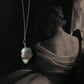 Timeless silver necklace featuring two Baroque pearls with organic shapes.