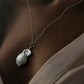 Exquisite silver necklace with a trio of Baroque pearls for a refined style.