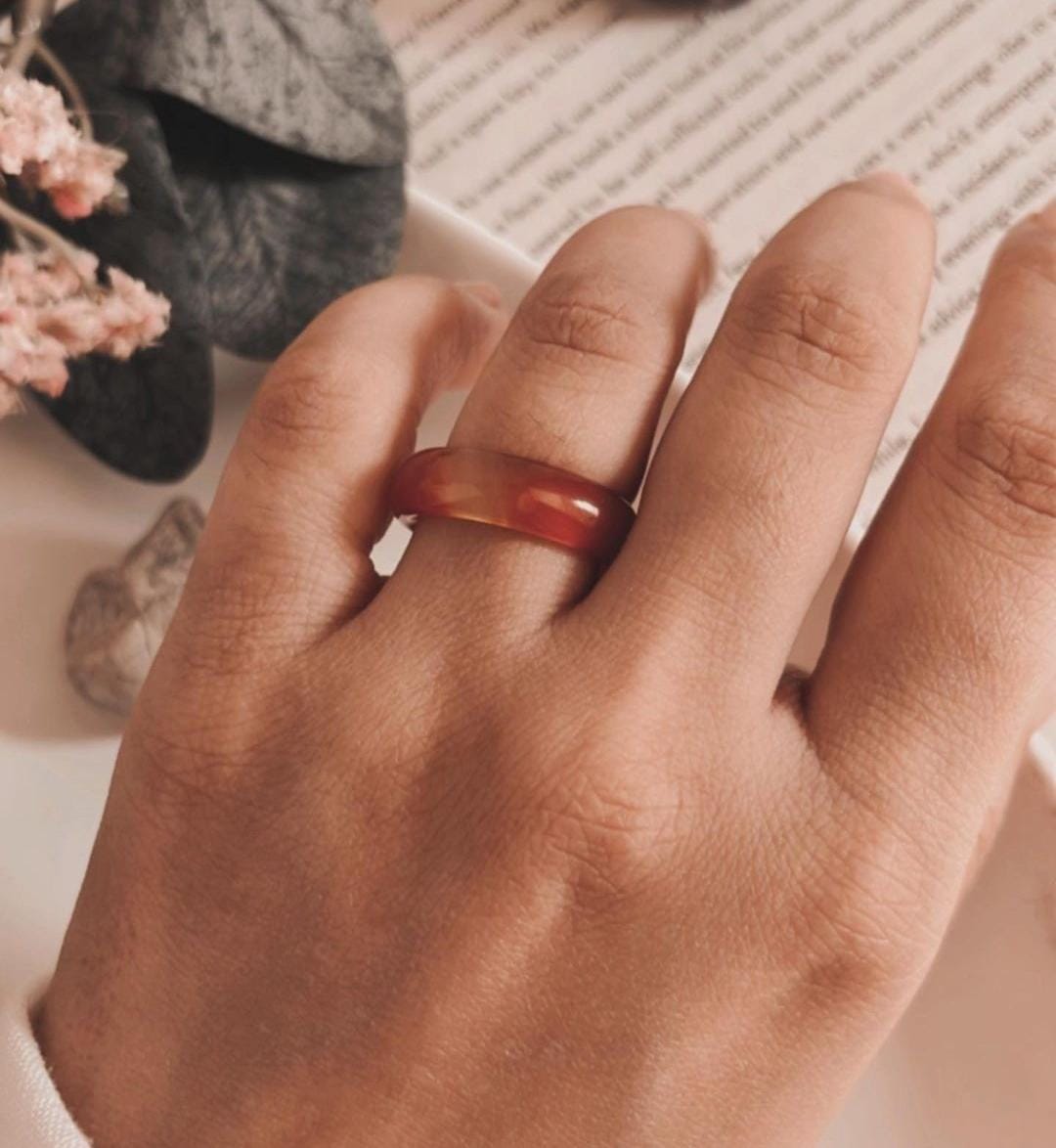 Unique carnelian crystal band ring featuring a wide design